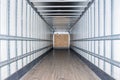 Interior view of empty semi truck dry van trailer Royalty Free Stock Photo