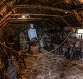 Interior view of the forge and blacksmith hut in the Sky Museum of Island Life