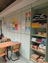 Interior View of a German Classroom with Rows of Lockers, Subject-Specific Shelving, and Educational Posters on Grammar Royalty Free Stock Photo
