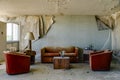 Intact Lodging Room with Burnt Orange Chairs & Couch - Abandoned Hotel