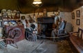 Interior view of the kitchen ands hearth with fireplace inside a typical Scottish Highlands cottage Royalty Free Stock Photo