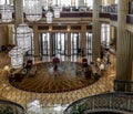 Interior view of a luxurious hotel, modern light chandelier in the hall