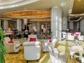 Interior view of a luxurious hotel, modern light chandelier in the hall