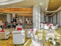 Interior view of a luxurious hotel, modern light chandelier in the hall