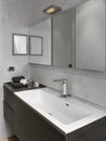 Interior view of a modern bathroom with close up on the washbasin