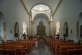 Interior view of a modern church with empty pews Royalty Free Stock Photo