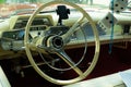 Interior view of old vintage car. View on dashboard of classic car