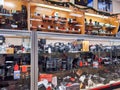 Interior view of Omega Photo store, displaying vintage and newer cameras and lenses for sale behind a glass case