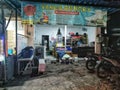 An interior view of a small laundry business premises on a city street in Indonesia Royalty Free Stock Photo