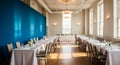 Elegant Event Hall with Blue Wall and Set Tables for a Formal Gathering conference room Royalty Free Stock Photo