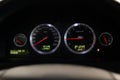 Interior view with speedometer, tachometer, instrument panel and dashboard of black Volvo S60 car stands in the showroom after dry Royalty Free Stock Photo