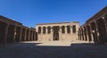 Interior View of the Temple of Edfu with Carved Pillars and Ancient Egyptian Drawing on the Wall Royalty Free Stock Photo