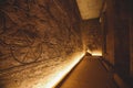 Interior View to the Great Temple at Abu Simbel with Ancient Egyptian Pillars and Drawing on the Walls Royalty Free Stock Photo