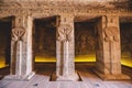 Interior View to the Great Temple at Abu Simbel with Ancient Egyptian Pillars and Drawing on the Walls Royalty Free Stock Photo