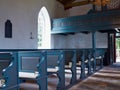 Interior view of a traditional church with empty pews Royalty Free Stock Photo