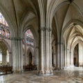 Interior view of the Troyes Cathedral with side and central nave and stained glass windows Royalty Free Stock Photo