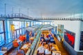 Interior of Vytopna restaurant with tables and small railroad tracks in Prague, Czech Republic