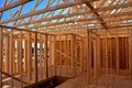 Interior wall framing of new home under construction. Royalty Free Stock Photo