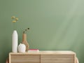Interior wall mockup,Green wall and wooden cabinet