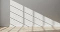Interior Wall with Sunlight Casting Geometric Shadows on Textured Surface and Wooden Floor Royalty Free Stock Photo