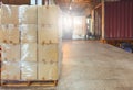 Interior of warehouse dock, Large pallet shipment boxes, Truck docking load cargo at warehouse