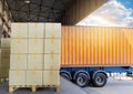 Interior of warehouse dock, Large pallet shipment goods, truck docking load cargo at warehouse Royalty Free Stock Photo