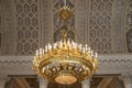 The interior of the white-Columned hall in the Yusupov Palace on the embankment of the Moika river, ceiling decor and chandelier. Royalty Free Stock Photo