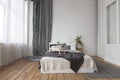 Interior of white and gray cozy bedroom