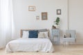 Interior of white and gray cozy bedroom