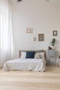 Interior of white and gray cozy bedroom