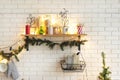 Interior white kitchen with lights and red christmas decorations Royalty Free Stock Photo