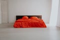 The Interior of the white room with a bed with red Royalty Free Stock Photo