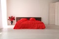 The Interior of the white room with a bed with red Royalty Free Stock Photo
