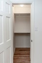 Interior white solid wood closet with wood shelves Royalty Free Stock Photo