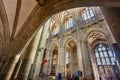 Interior of Winchester Cathedral,framed by an archway.