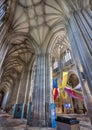 Interior of Winchester Cathedral,with towering pillars.