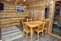 Interior of a wooden house, walls made of wood Royalty Free Stock Photo