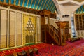 Interiors with red Arabic traditional carpet in King Abdullah I Mosque in Amman, Jordan, built in 1989 by late King Hussein in