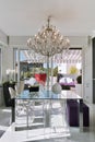 Interiors shots of a modern dining room with glass table