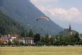 INTERLAKEN, AUGUST 02, 2022 - Tourists paragliding in Interlaken, Bernese Oberland, Switzerland