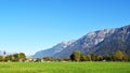 Interlaken, Switzerland, Mountains, houses and huge lawn yard field