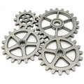 Interlocking cogs symbolizing teamwork and collaborationisolated on white background Royalty Free Stock Photo