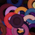 Interlocking, colorful circular shapes create a dynamic, abstract pattern. Bright hues like