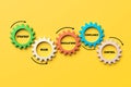 Interlocking gears representing strategy, rules, regulations, compliance and control
