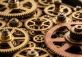 Interlocking gears of various sizes and materials, primarily brass and copper, are intricately Royalty Free Stock Photo