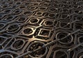 Interlocking geometric metal patterns create a textured, industrial Royalty Free Stock Photo