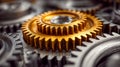 Interlocking golden and silver gears working together in a mechanical system representing precision engineering and industrial Royalty Free Stock Photo