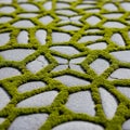 Interlocking gray stone pavers with irregular shapes form a patterned surface. Bright green moss Royalty Free Stock Photo
