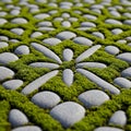 Interlocking gray stones arranged in a geometric pattern with lush green moss filling the gaps. The Royalty Free Stock Photo