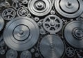 Gears of varying sizes are arranged intricately, creating a complex Royalty Free Stock Photo